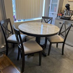 Beautiful dining table with four chairs