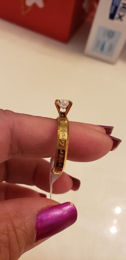 Stainless Steel yellow gold. Size 9