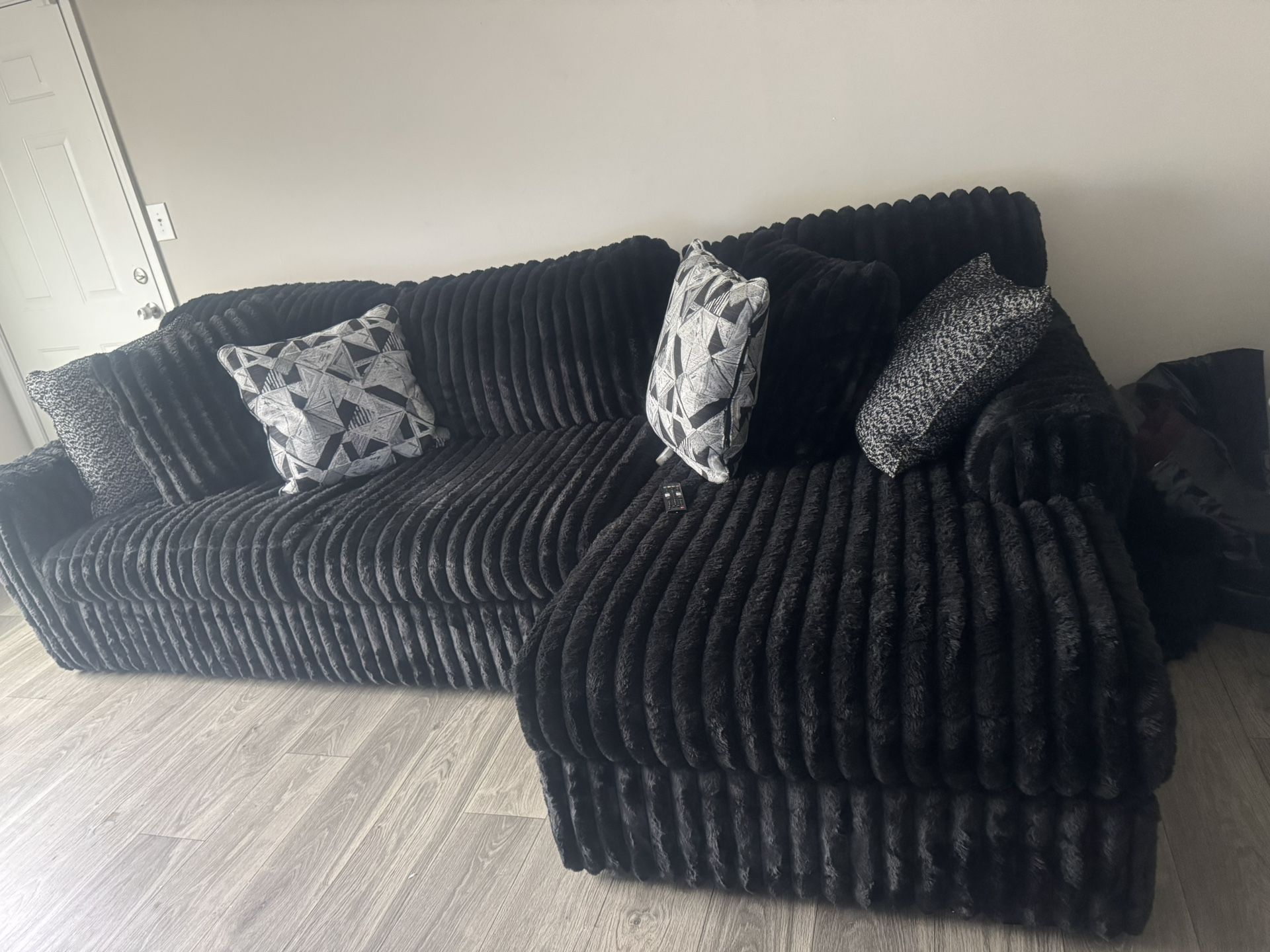 Design by Ashley Midnight-Madness 2 Piece RAF Sectional with Chaise