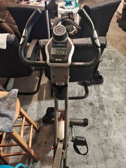 Exerpeutic   8 level folding exercise bike