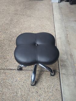 Adjustable rolling stool