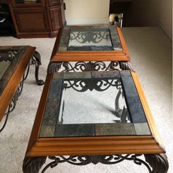 Wrought iron, stone and glass tables. Beautiful condition.