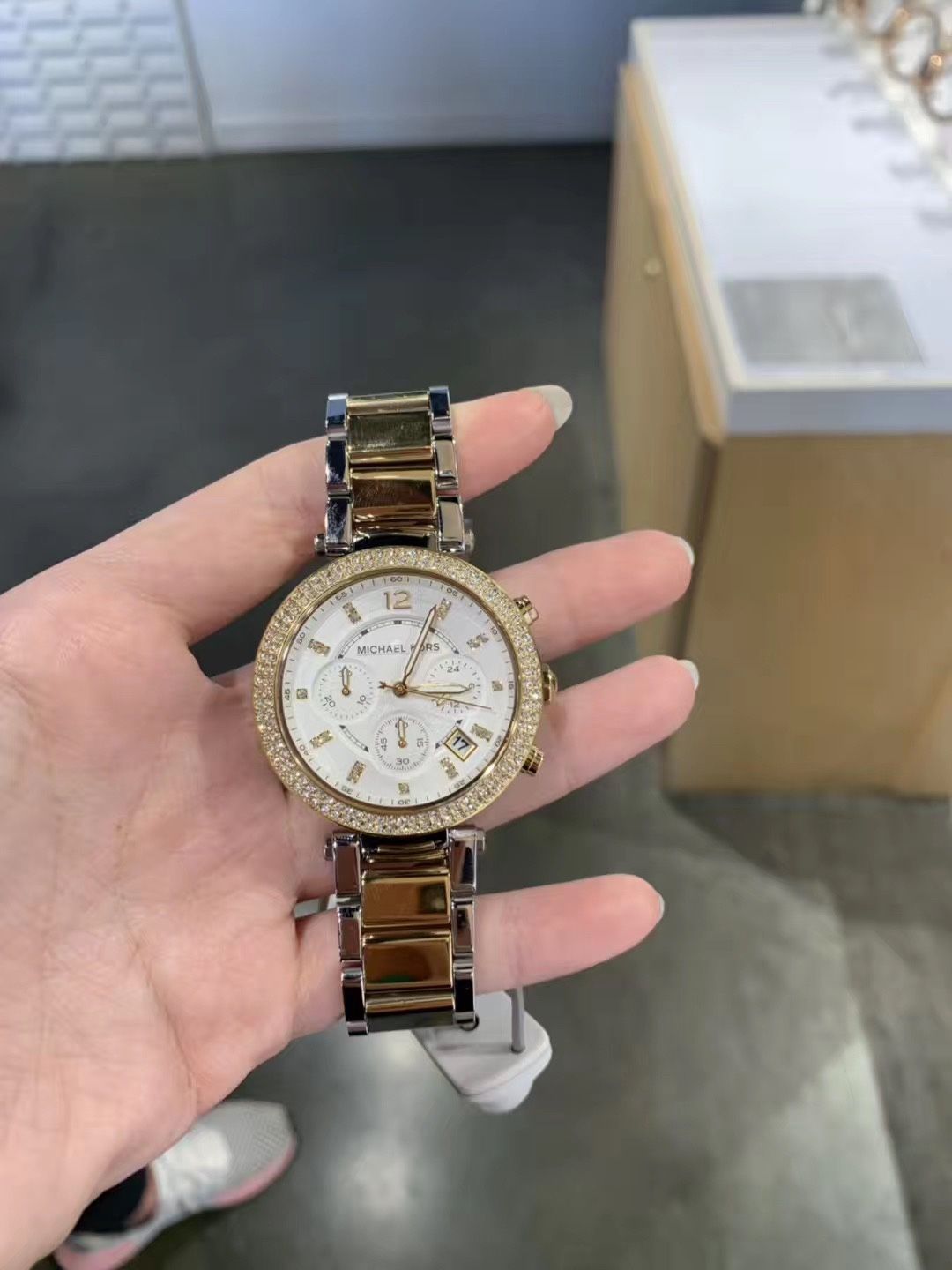 Michael Kors watch with diamond around