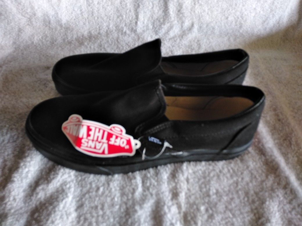 BLACK SLIP ON VANS MENS 7 / WOMANS 8.5