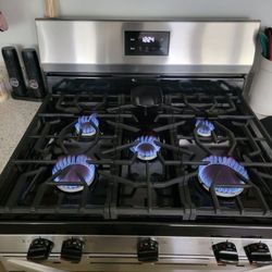 stainless steel Frigidaire kitchen appliance set. Natural gas range 2025