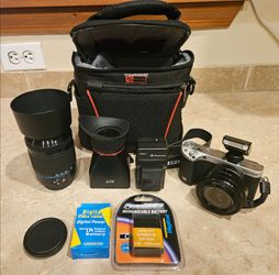 Samsung NX500 Mirrorless Camera Body 28.2mp w/ 50mm-200mm lens, 16mm-50mm lens, View Hood, and mor e.