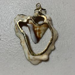 Shell Pendant Trimmed In Gold