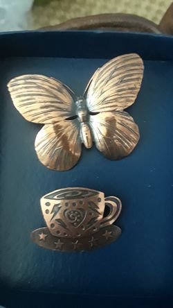 2 copper brooch