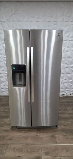 Kenmore refrigerator side by side freezer