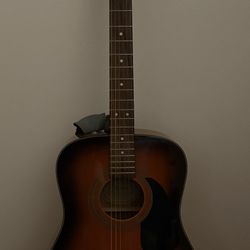Acoustic Guitar With Case 