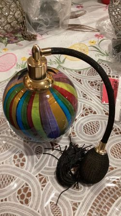 Murano glass vintage perfume bottle  6 inch tall 12 inch circular