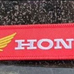 Honda wings red key holder.