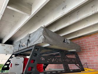Cbi rack , water and gas container w/locks , 2 traction boards, and 3 person tent