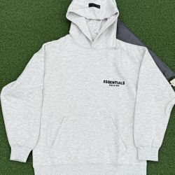 Essentials light oat hoodie (S)