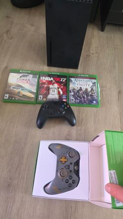 Xbox X with two controllers and wires, three games. ODO