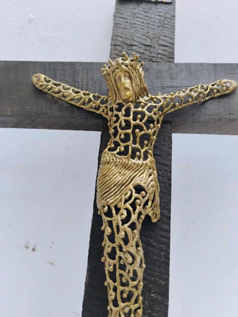 Unique hand made cross of soldered brass wire on wood
