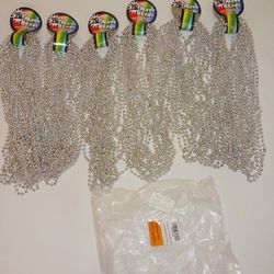 72 pieces of silver party/mardi Gras bead Necklaces 33 in long brand new with the tags