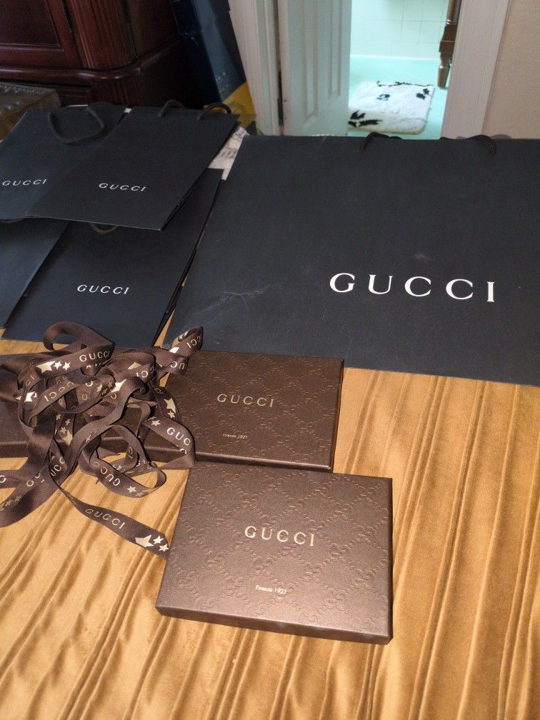 Empty Gucci Bags And Ribbon