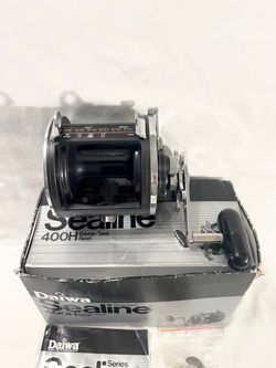 Old stock like new, not used. With box, pole clamp & manual. Daiwa SeaLine-400H series heavy action, ocean fishing reel. Retails $220
