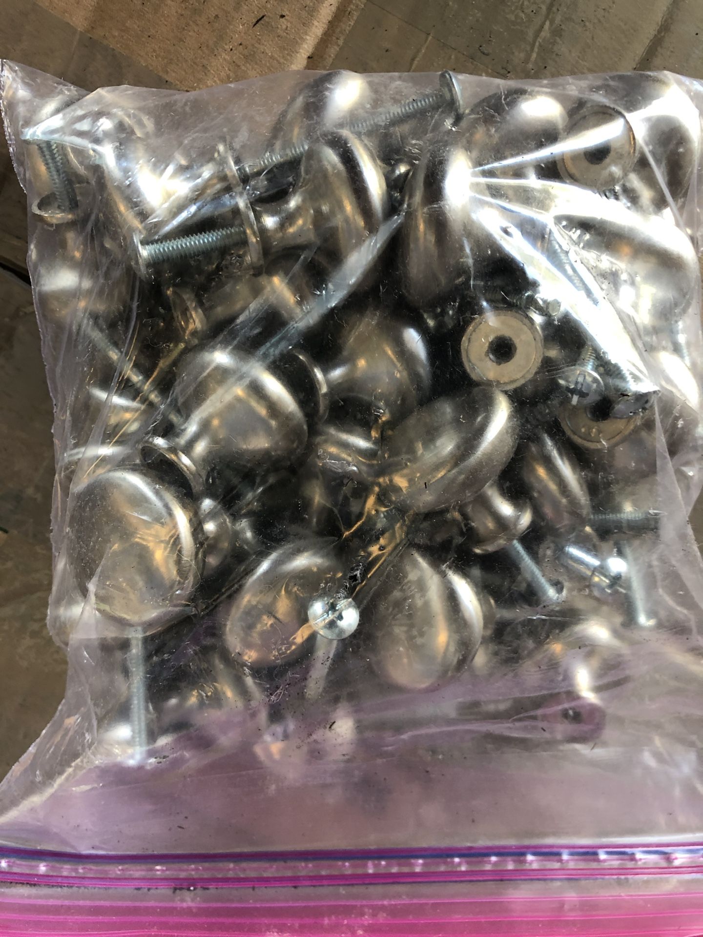 Cabinet knobs and screws- 1 bag