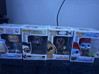 Funko Pops (cat Woman, This Is Fine Dog, Papa Smurf, Robin)