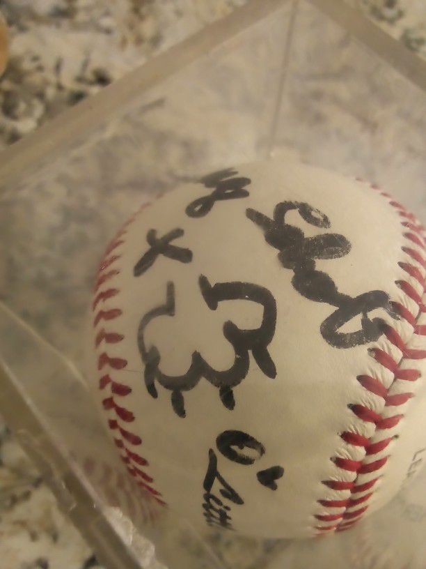 

Marge Schott/Schottzie Signed Baseball w/OZ  Inscription. Cincinnati WS Champions Owner.  Not Authenticated but guaranteed to pass.I personally met 