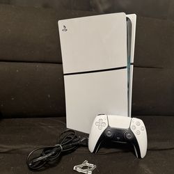 White PS5 with controller and stands