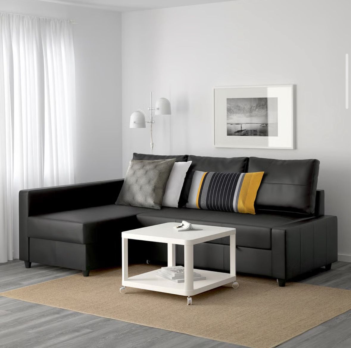 IKEA L shaped Sofa with Pull out bed futon and storage sectional sleeper couch bombstad black