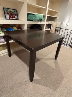 Dark Brown Wooden Dining Table
