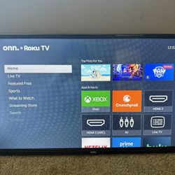On ROKU 32 Inch TV Perfect Condition 