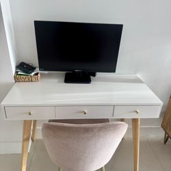 White desk or vanity with gold hardware 