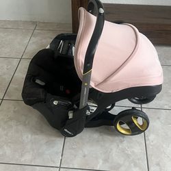 Doona Carseat/ Stroller And Base Included