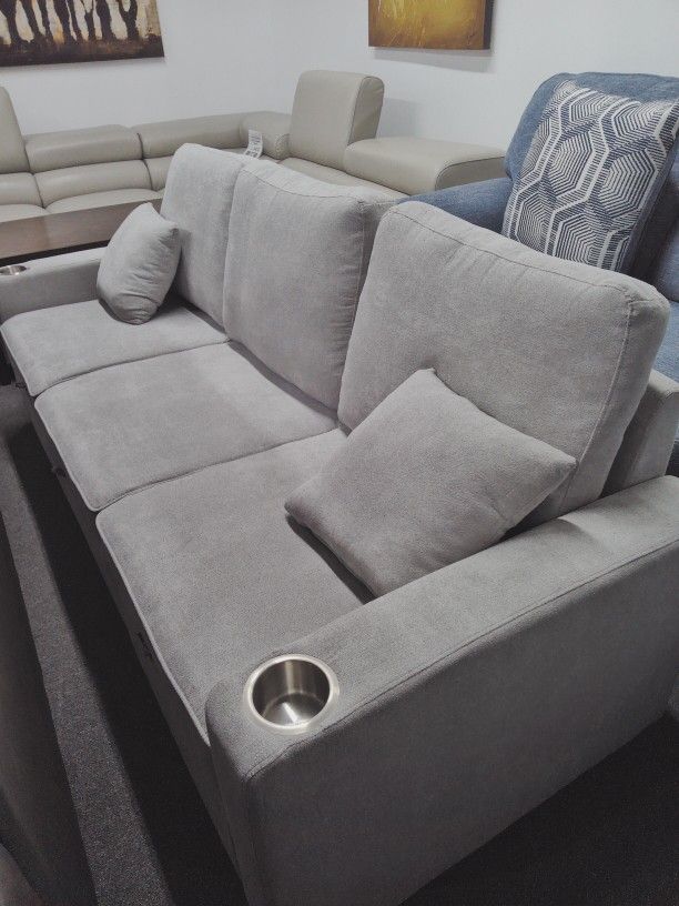 82.50"W  Small Sleeper Sectional in Gray Fabric, w/ Stainless Steel Cup Holders.