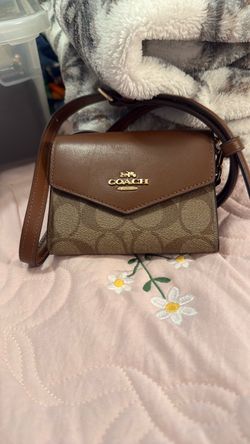 Brand new Coach crossbody wallet