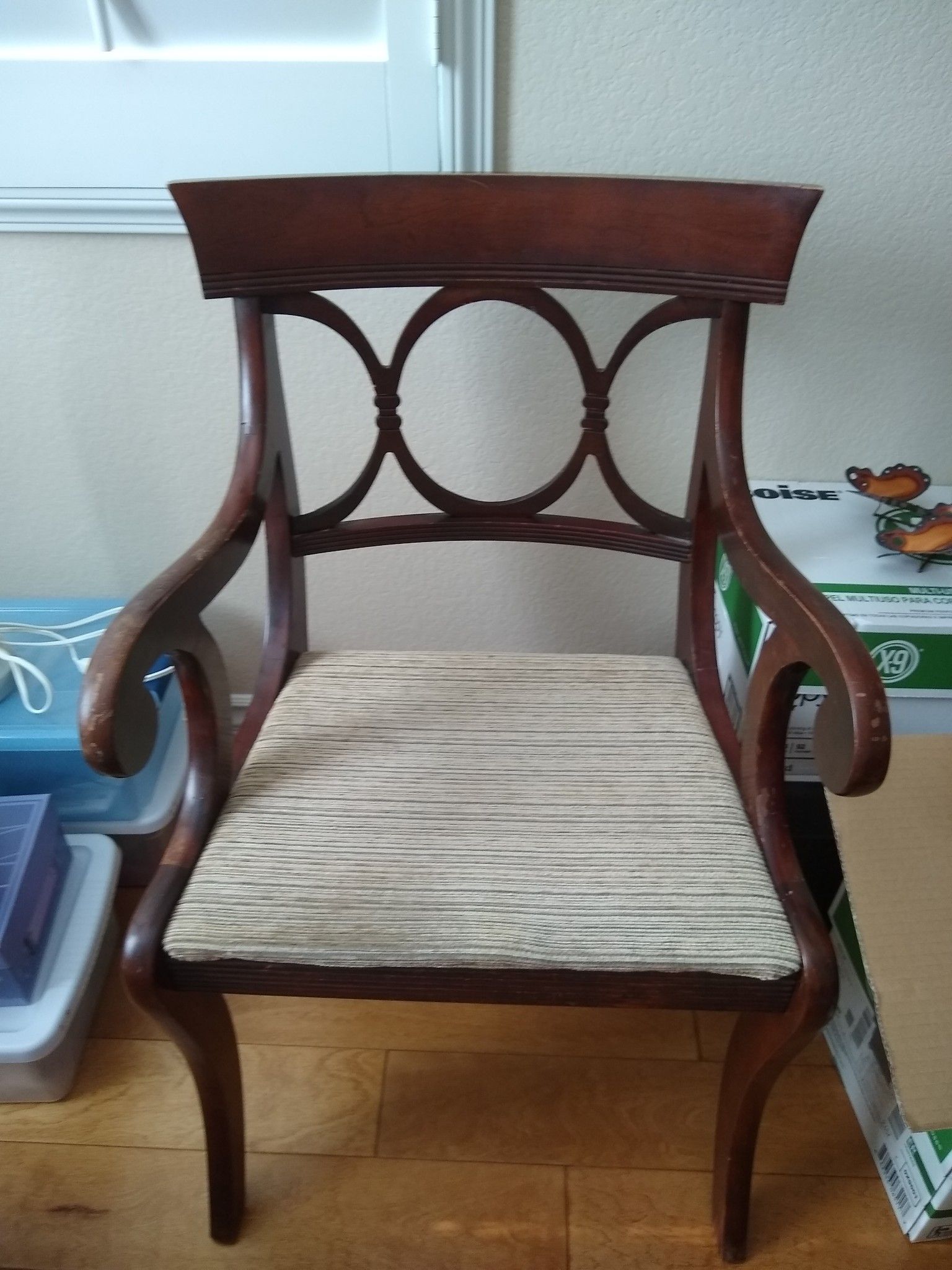 Two vintage Mahogany Duncan Phyfe dining arm chairs manufactured by Tell City furniture company in Indiana