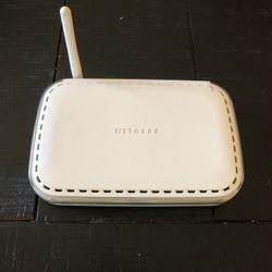 Netgear WGR614 54 Mbps 4-Port 10/100 Wireless G Router (WGR614v6)