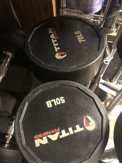 TITAN FIXED 50 & 70 POUND URETHANE EZ CURL BARS. Barbells are heavy, buyer must be able to haul alone or with helper