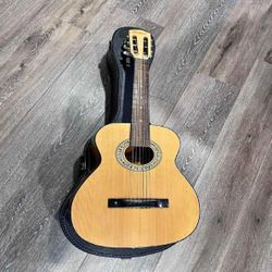 Acoustic Guitar - Rich Sound and Timeless Style former four