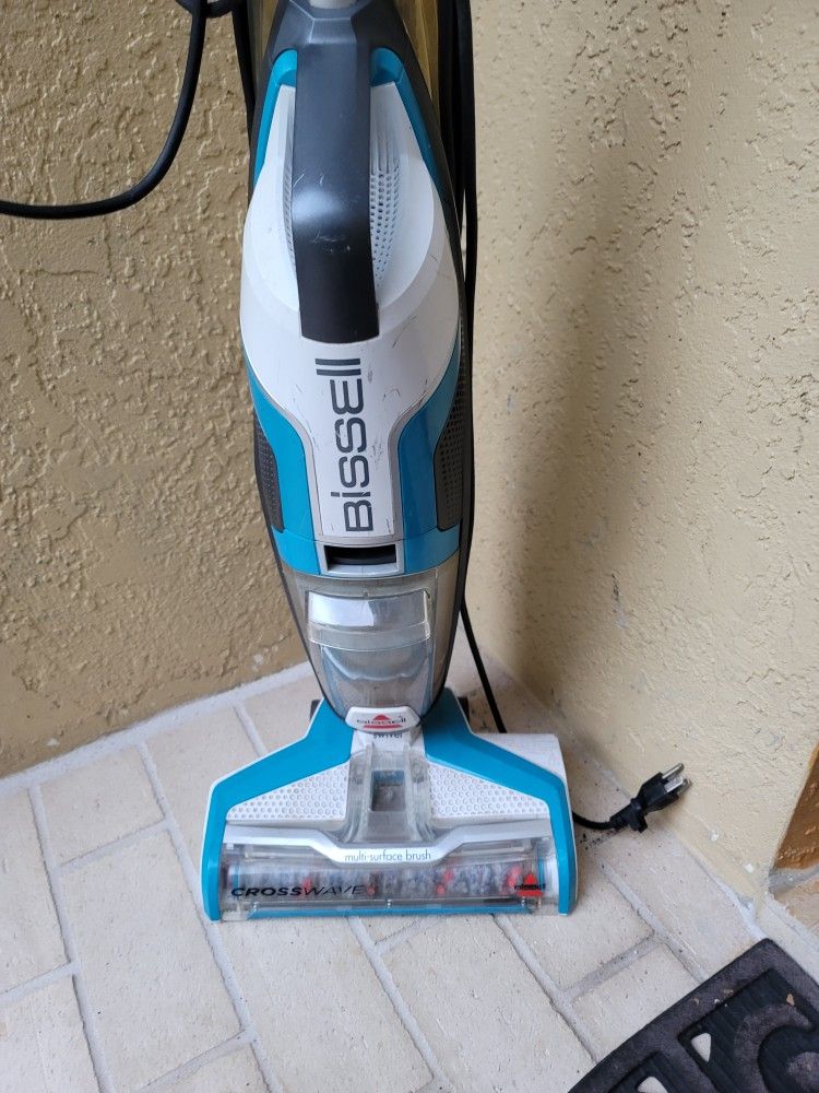 Bissell crosswave carpet shampooer for parts. turn turn off