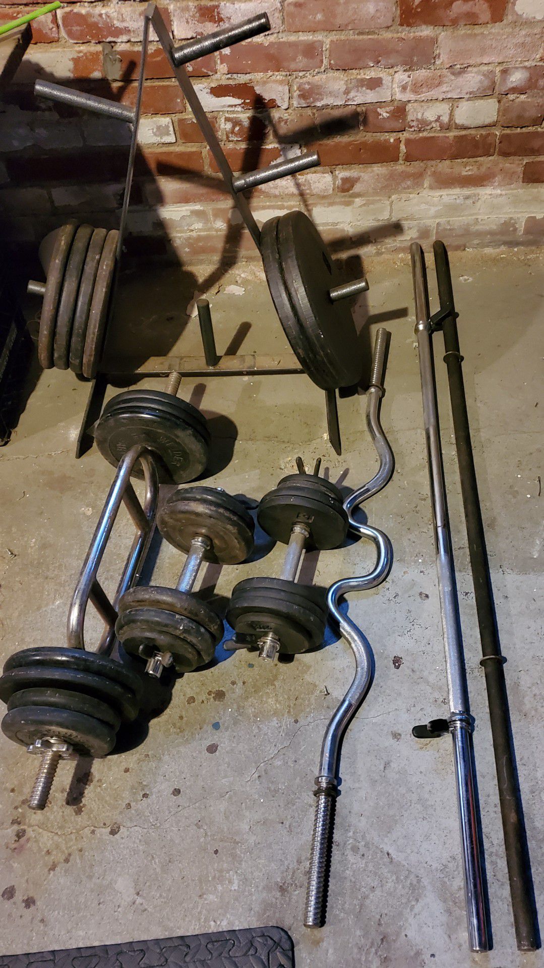 300 lbs of Weights+ plate tree + bars