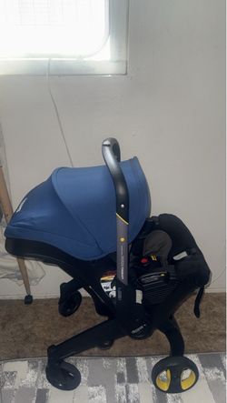 donna  blue car seat and stroller .
