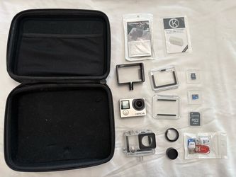 GoPro Hero 4 Camera w/ $500+ of Accessories