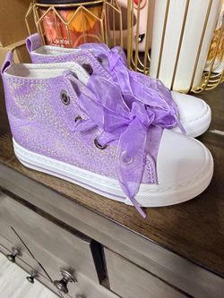 Purple and white shoes