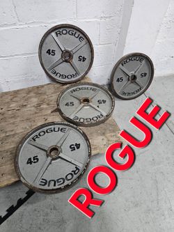 4 Rogue 45LB Machined Olympic Weight Plates. Homestead 33033. Delivery fee.

Heavy-duty cast-iron Rogue 45lb machined Olympic weight plates come in a 