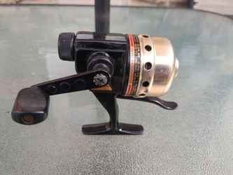 Daiwa Underspin closed face spinning reel. 