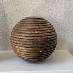 decorative wooden orb or ball