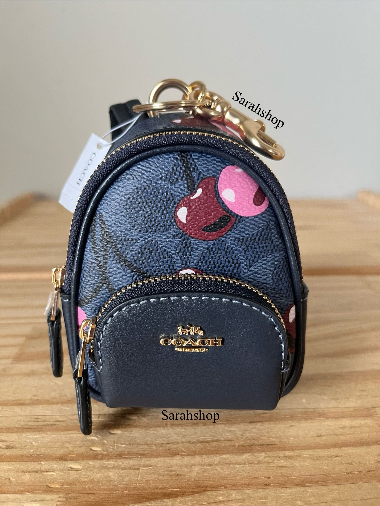 Coach Mini Court Backpack Bag Charm In Signature Canvas With Cherry Print