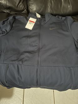Nike zip up size large and m navy blue light weight jacket new with tags reg 55$ for 25$
