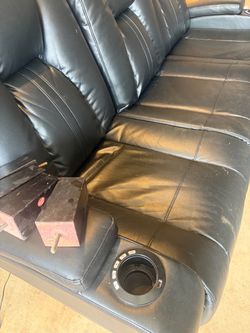 Black FauxLeather Reclining Sofa with Cup Holders