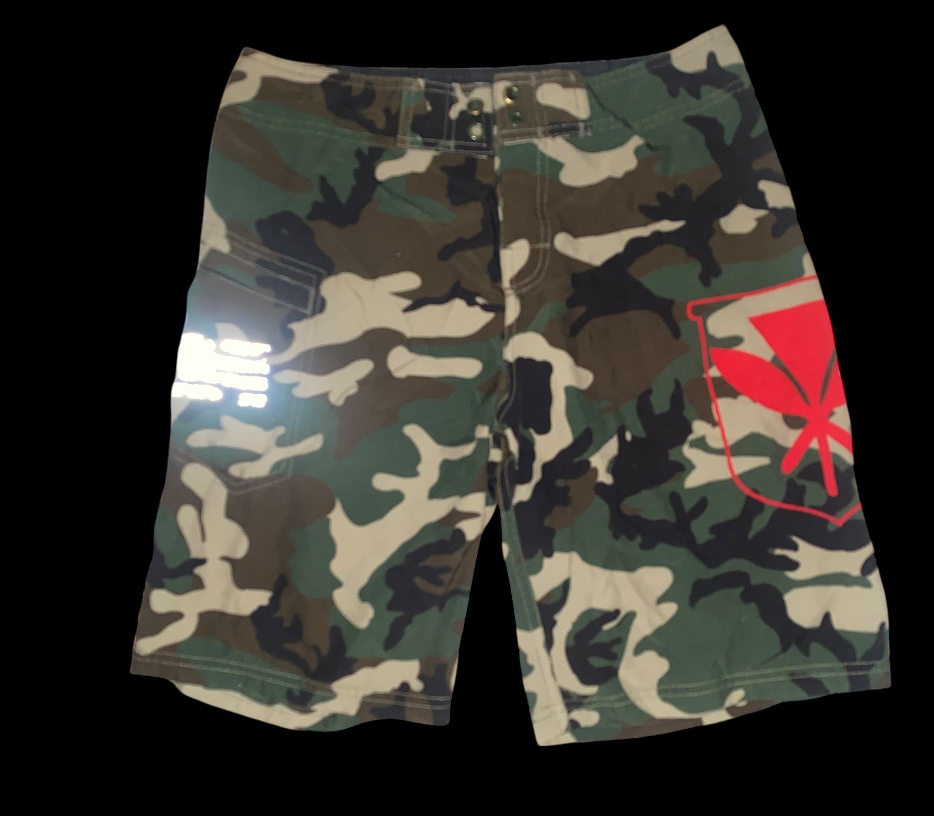 Wailoa "Green Camo Kanaka" Boys board shorts.  Size boys 14  Inseam 11”